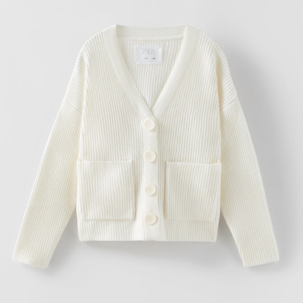 Fits women xs-s. White cardigan with white buttons